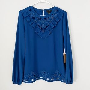Blue silky blouse with lace details